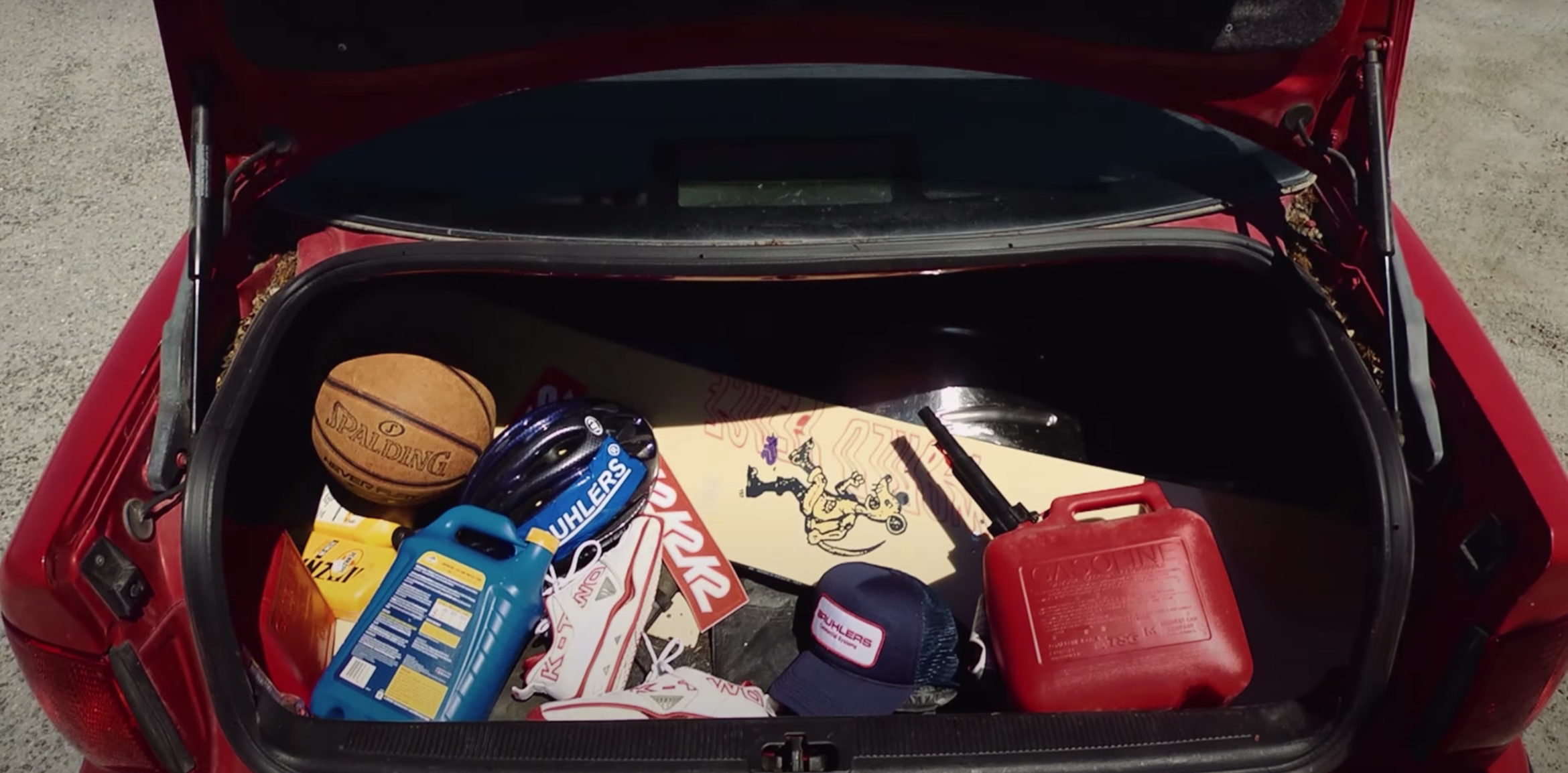hero-k2-2021-hero-image-with-assorted-items-in-the-trunk-of-a-car-anjes-design
